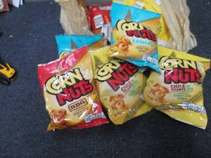 lot 163 image: 12- 4 oz Assorted Corn Nuts ...