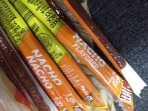 lot 167 image: 12 Slim Jims Nacho Beef Sticks...