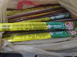 lot 179 image: 12 Slim Jims Tabasco Beef Sticks...