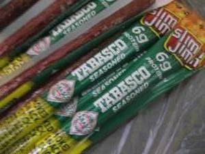 lot 180 image: 12 Slim Jims Tabasco Beef Sticks...