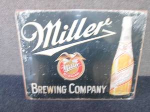 lot 462 image: Metal Miller Sign 16x12.5 inches...