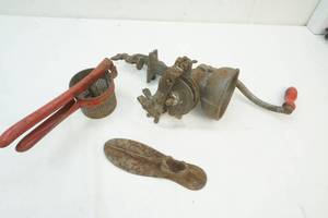 lot 34 image: antique meat grinder, potato ricer and shoe horn