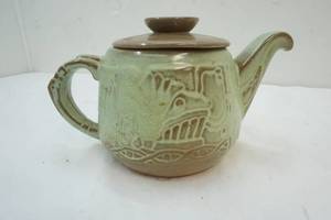 lot 57 image: stoneware teapot with lid