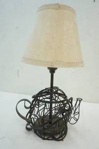 lot 59 image: wire teapot lamp