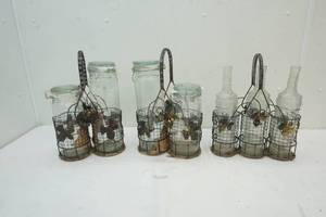 lot 82 image: canisters and oil jars