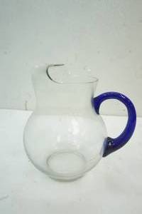 lot 111 image: Glass Pitcher with Blue handle