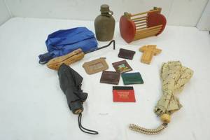 lot 131 image: Shoe Stretcher, 3-Umbrellas, small apple holder, coin purses, wooden cross