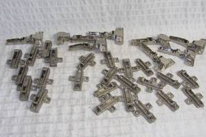lot 43 image: Assortment of 16 Stainless Steel Cabinet Hinges