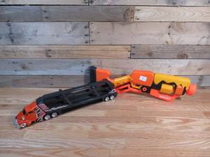lot 7 image: Hot Wheels Semi-Truck & Roblox Nerf Gun