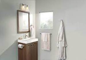lot 29 image: Moen Wellton 4-piece Bath Hardware Set (Y1394BN)