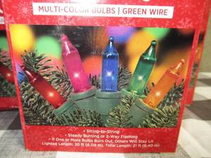 lot 146 image: Lot of 9 Holiday Style 100 IndoorOutdoor Mini Lights-ClearMulti-Colored Bulbs-GreenWhite Wire