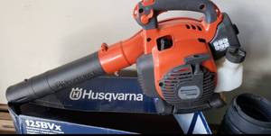 lot 78 image: Handheld BlowerVacuum Made by Husqvarna- Model 125BVx