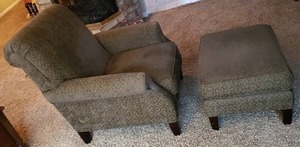 lot 16 image: Retrospect Upholstered Chair and Ottoman