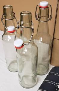lot 143 image: Clear Glass 16 oz Swing Top bottles - NEW (Lot of 5)