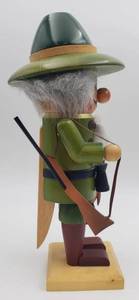 lot 277 image: Vintage Nutcracker A Hunter with a Rifle and Bird