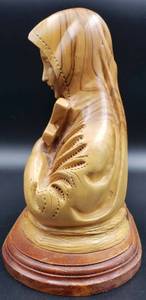 lot 281 image: St. Teresa Holding a Cross Made from Olive Wood