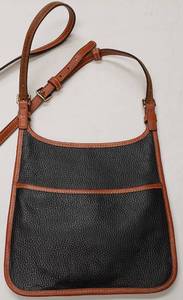 lot 158 image: Dooney & Bourke Pebble Leather Saddle Flap Magnetic Closer Handbag