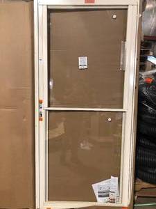 Andersen 3000 Series 36 in. x 80 in. Almond Right-Hand Retractable Storm Door with ORB Hardware  Customer Returns See Pictures