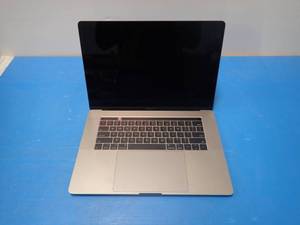 lot 80 image: Apple&nbspMacBookPro14,3 A1707 MPTR2LLA Laptop &nbspINTEL(R) CORE(TM) I7-7700HQ CPU  2.80GHZ  16GB DDR4 SDRAM  251GB SSD  15 screen with 3360 x 2100 2K Resolution  Includes IOS and Charger  Line of Anti-Glare Film Peeling in screen