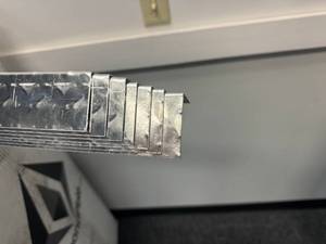 Seven Right Angle Diamond Plate with plastic still on and Roll of Diamond Plate