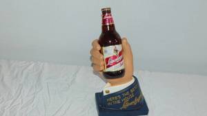 lot 5C image: Leinenkugels Countertop Beer Hand Holding Bottle Figural Statue with Bottle