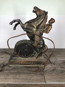 lot 69 image: Antique Sessions  Horse & Cowboy Western Brass Clock