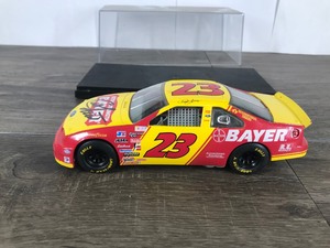 lot 119 image: 1995 Nascar Racing Champions Chad Little #23  Extra Strength Bayer 124 scale die cast stock car with Signature on Hood