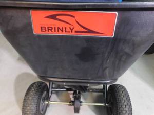 lot 202 image: Lg Brinly pull behind spreader