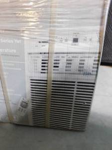 lot 217 image: New in box Frigidaire window air conditioner with remote