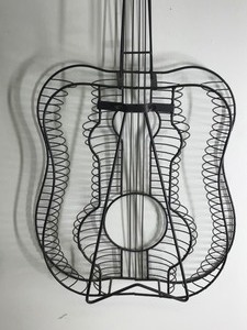 lot 159 image: Large Metal Wire Form Guitar-Music Decoration-Iron Guitar With Stand86 Slots for CDs