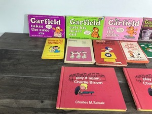 lot 451 image: Garfield - Snoopy - Charlie Brown Books and More