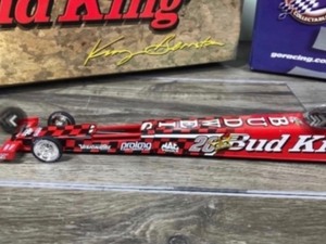 lot 464 image: 1999 NHRA Action Racing Collectibles Kenny Bernstein  Budweiser 20th Anniversary 124 scale die cast Top Fuel Dragster
