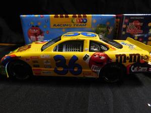 lot 237 image: 2 car set of 1998 Racing Champions 50th Anniversary Big mac  Bill Elliot #94 Ford Taurus 124 die cast car