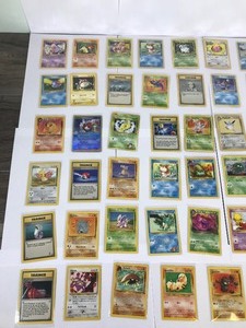 lot 520 image: 58 Collectible Pokmon Cards