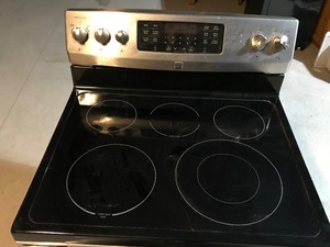 lot 9 image: Kenmore ceramic top electric .stove
