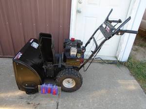 8 hp Extreme snow blower 26 with electric start. Good solid unit. Doesnt free wheel. Tested & works. As shown.