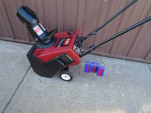 Toro Snow Thrower 20 2 cycle. Used condition. Tested & works. As shown.