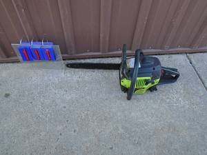 Poulan 16 chainsaw. Used condition. Fires on ether. As shown.