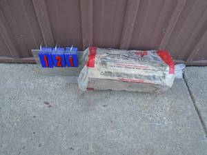 Bundle of hot wood seasoned firewood. As shown.