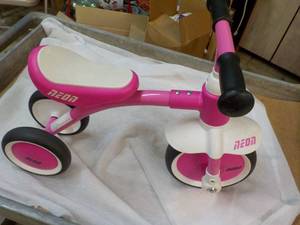 Neon Pink and White Toy Ride On