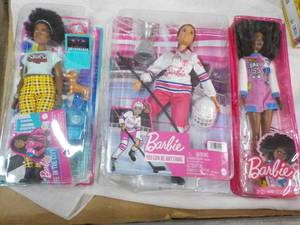 3 Barbies...