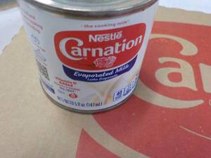 24 ct 5 oz Cans Nestles Carnation Evaporated Milk - best date 08312023