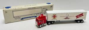 lot 192 image: Limited Edition 164 Scale Die-Cast Grain Belt Premium Kenworth K100E (NIB)