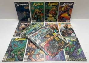lot 295 image: Misc. Comics Including Aquaman And More (In Protecive Sleeves On Card)