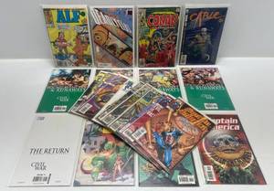 lot 302 image: Misc. Comics Including ALF And More (In Protecive Sleeves On Card)