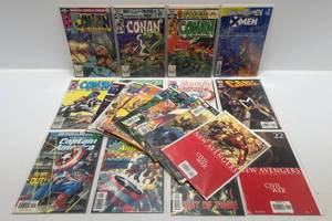 lot 305 image: Misc. Comics Including 50 Cent Conan And More (In Protecive Sleeves On Card)
