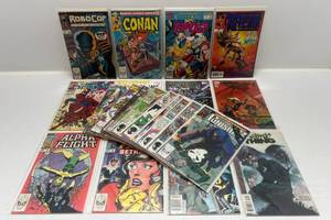 lot 306 image: Misc. Comics Including 50 Cent Conan And More (In Protecive Sleeves On Card)