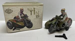 lot 79 image: Reproduction 1950s Harley-Davidson Side Car Tin Toy Limited Edition 0093725,000  Wind-Up Style, With Key, In Original Box