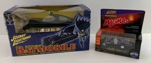 lot 87 image: Johnny Lightning 1950s DC Comics Batman Batmobile 124 Die-Cast Model Kit (NIB) & Johnny Lightning Magmas The Munsters Drag-U-La (NIB)