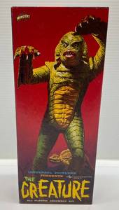lot 118 image: 1999 Aurora Universal Pictures Presents The Creature Model Kit # 7501 (Open Never Assembled)